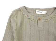 Lil Atelier top tuffet flæse